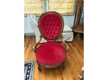 Red Cushioned Arm Chair