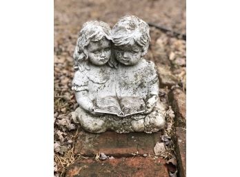 Garden Sculpture Of Young Children Reading