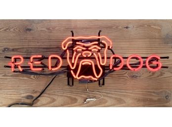 A Vintage Neon Red Dog Sign