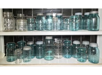 A Large Collection Of Vintage Mason Jars And More