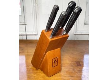 A Knife Block With Knives