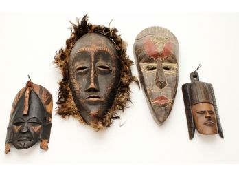 Four Vintage African Carved Wood Masks
