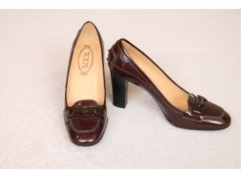 Tod’s Cordovan Patent Leather Pumps