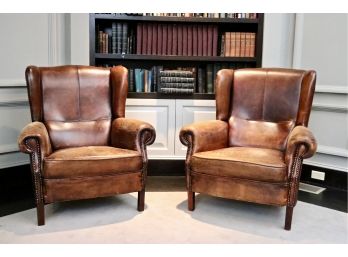 Pair Of Luxurious Brass Nailhead Accented Leather Wingback Chairs