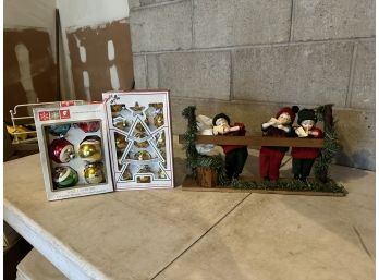 Group Of Christmas Carolers And Ornaments