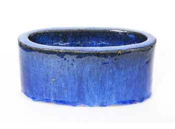 Elongated Blue Glazed Ceramic Vase