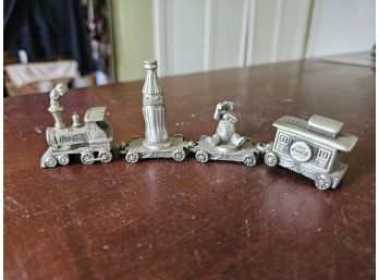 Auction Item #28  Vintage Mini Cocoa Cola Pewter Train With 4-Cars. Mint Condition