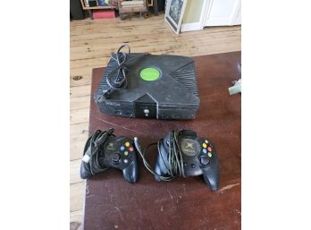 Item #10 - Vintage Original Microsoft X-Box Console And 2 Controllers. Powers Up