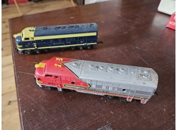 Auction Item #20 - Lot Of 2 Vintage HO Santa Fe Train Engines In Good Condition