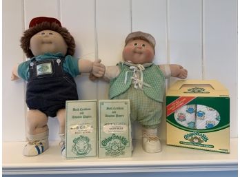 Two Boy Cabbage Patch Dolls With Box Of Diapers