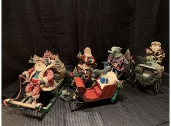 S73  Lot Of Santa Claus Figures - With Sleigh