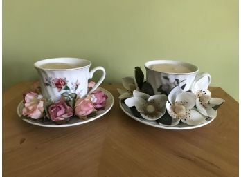 Two Decorative Tea Cups And Saucers With Candles