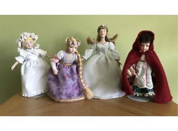 Four Avon Porcelain Dolls