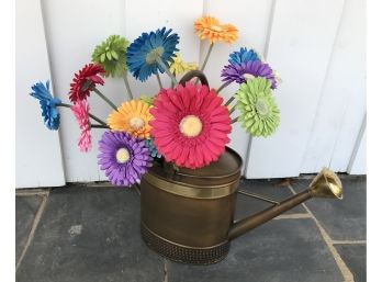 Copper Colored Watering Can With Colorful Faux Gerber Daisies