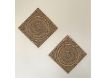 Pair Of Floral Wall Plaques In An Antique Finish