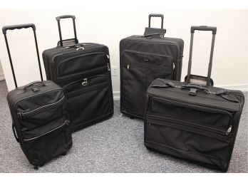 Four Rolling Suitcases