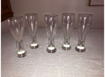 Group Of Several Beer Drinking Glasses