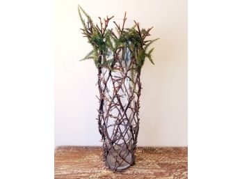Large Twig Basket Over Glass Vase