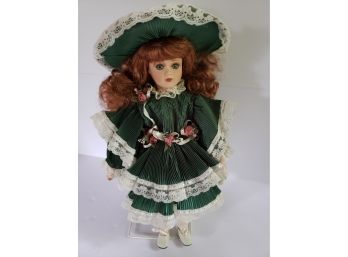 Seymour Mann Connoisseur Doll Collection Hand Painted Porcelain Doll In Stunning Emerald Green Dress Like New In Box