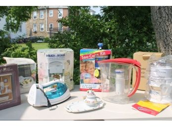 Housewares Lot Including Electric Can Opener, Sno Cone Kit, Brita, Electric Iron, Steamer & More