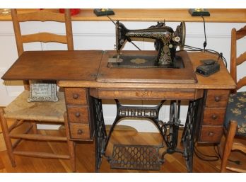 Antique Singer Sewing Machine In Oak Desk