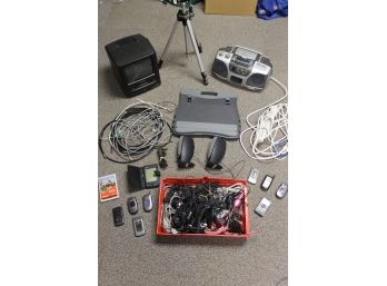 Large Lot Of Electronics Including T.V., Radio, Speakers, Phones And Cables Plus More