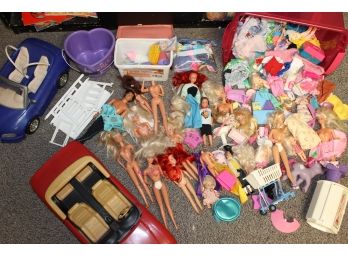 Huge Lot Of Barbie's And Barbie Related Dolls Including Tons Of Vintage Clothing