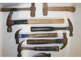 Group Of Seven Hammers And One Hammer Head