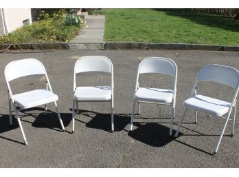 Set Of Four Metal Folding Chairs In White