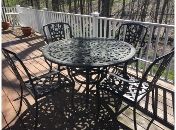 Cast Aluminum Table And Four Chairs