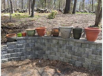 Fifteen Planter Pots On The Wall