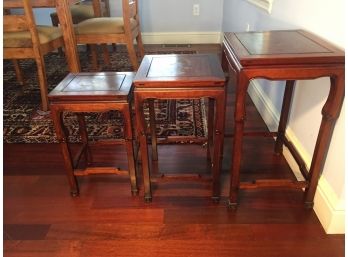 Three Nesting Tables With Etched Horse Theme On The Top Surfaces