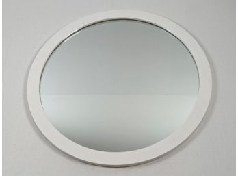 Large Round Mirror With A Wooden Frame