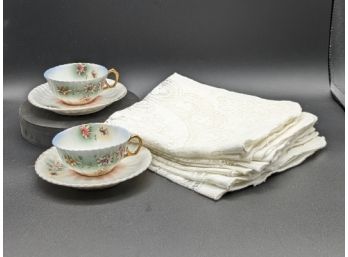 Time For Tea With Porcelain Cups And Lace Napkins