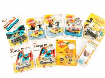 Group Of Mostly Corgi Cartoon And Action Figure Vehicles On Cards