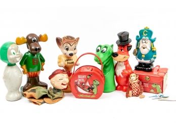 A Collection Of Various Cartoon Character Memorabilia