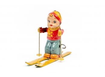 J. Chein Tin Litho Skiing Boy Wind-Up Toy