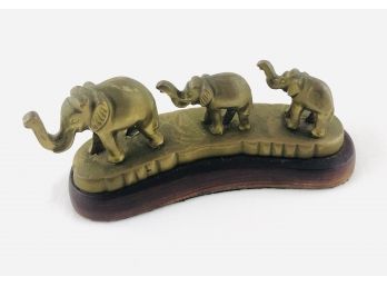 Vintage Wood And Brass Paperweight Depicting Elephants