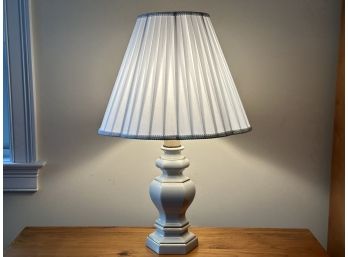 A Ceramic Lamp With A Deluxe Pleated Shade