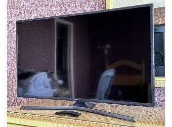A Samsung 40' Flatscreen TV - With Remote