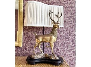 A Vintage Brass Stag Lamp On Carved Wood Base