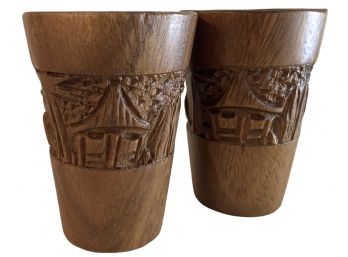 A Pair Of Hand Carved Tiki Tumblers