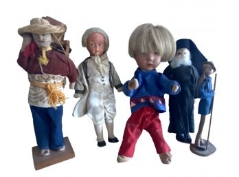A Collection Of Antique And Vintage Male Dolls From Around The World