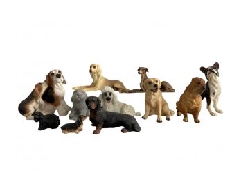 A Collection Of Small Resin Dog Figurines (B)