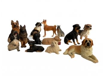 A Collection Of Small Resin Dog Figurines (A)