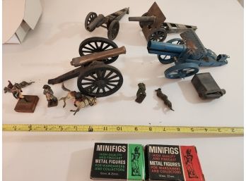 Metal Figures And Cannons
