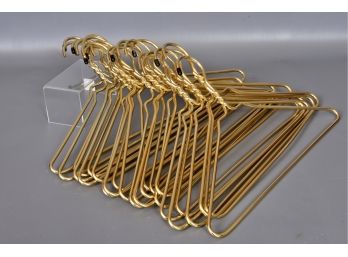 Collection Of 25 Gold Metal Hangers (2 Of 3)