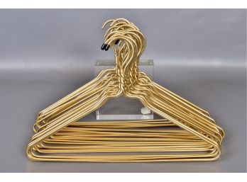 Collection Of 25 Gold Metal Hangers (3 Of 3)