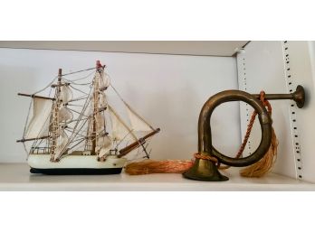 Vintage Bugle Paired With Model Sailboat