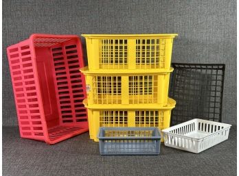 Assorted Storage Baskets In Brightly-Hued Plastic